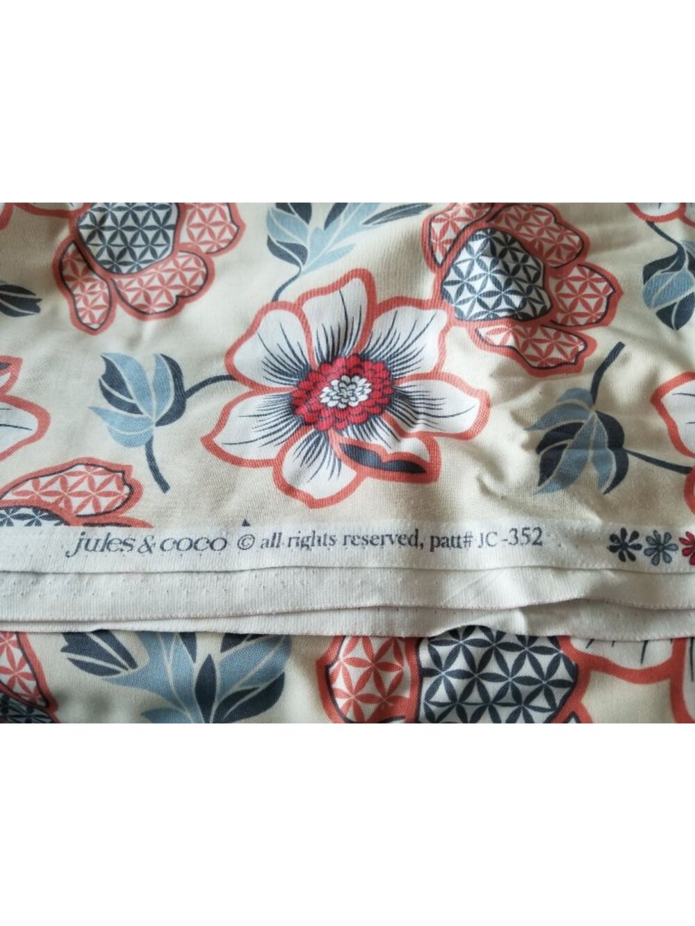 Material White Jules & Coco Fabric Flowers Orange Red Green Brown Green Leaves
